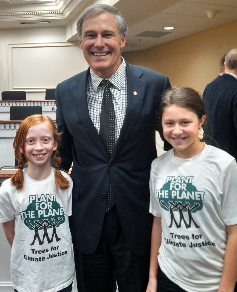  Ambassadors Wren and Zoe from Plant-For-The-Planet share a moment with Washington Governor Jay Inslee in Olympia.